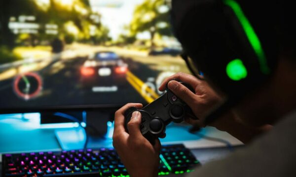 Teen playing video game